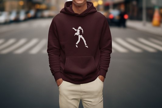 Person wearing a maroon michael jackson hoodie with a white graphic on a city street