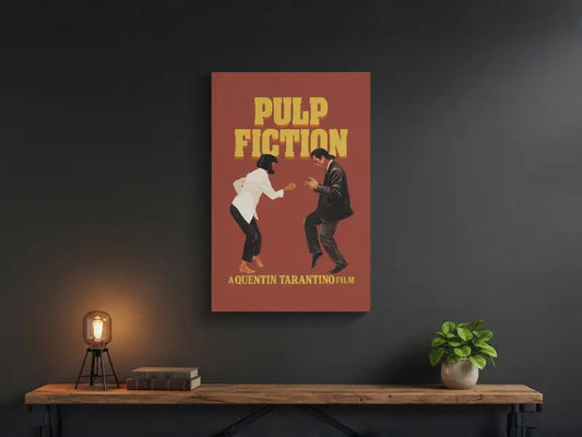 Pulp Fiction poster on a dark wall above a wooden shelf with a plant and lamp.
