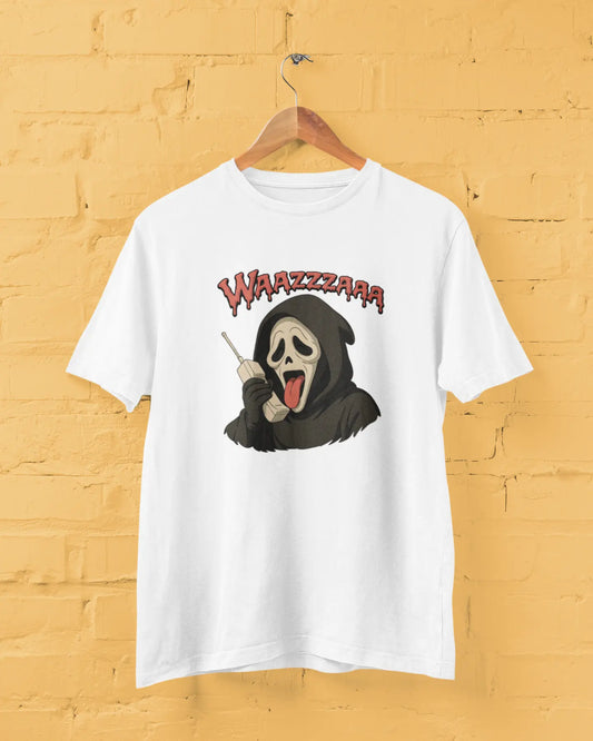 White t-shirt with a cartoon skeleton and 'WAZZZAA' text on a yellow brick wall background