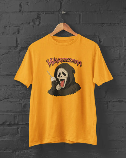 Yellow t-shirt with a graphic design of a cartoonish grim reaper and 'WAZZZAAR' text on a black brick wall background.